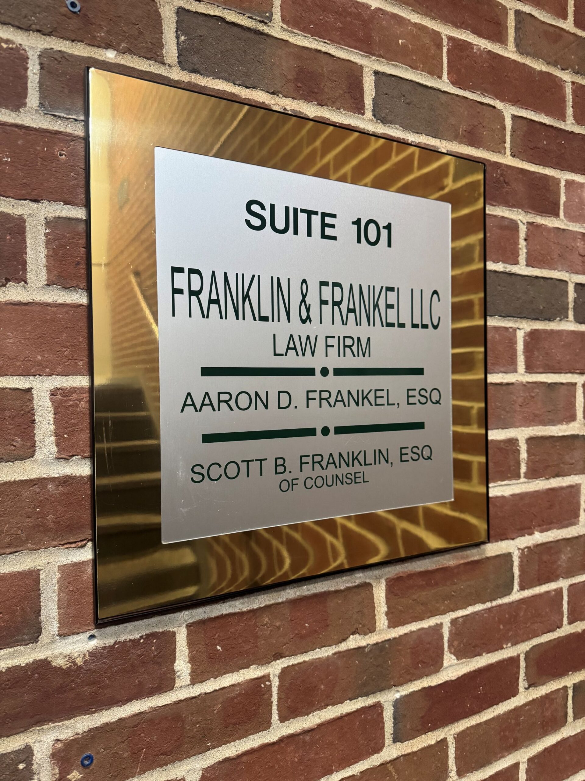 The sign outside of Franklin & Frankel LLC's office.